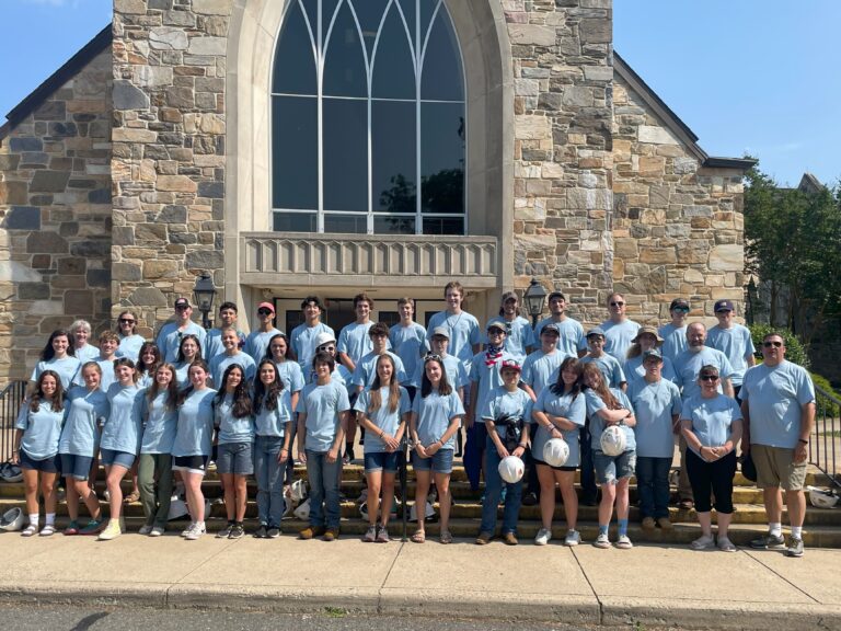 Group picture of teens and volunteers for the 2024 WorkCamp